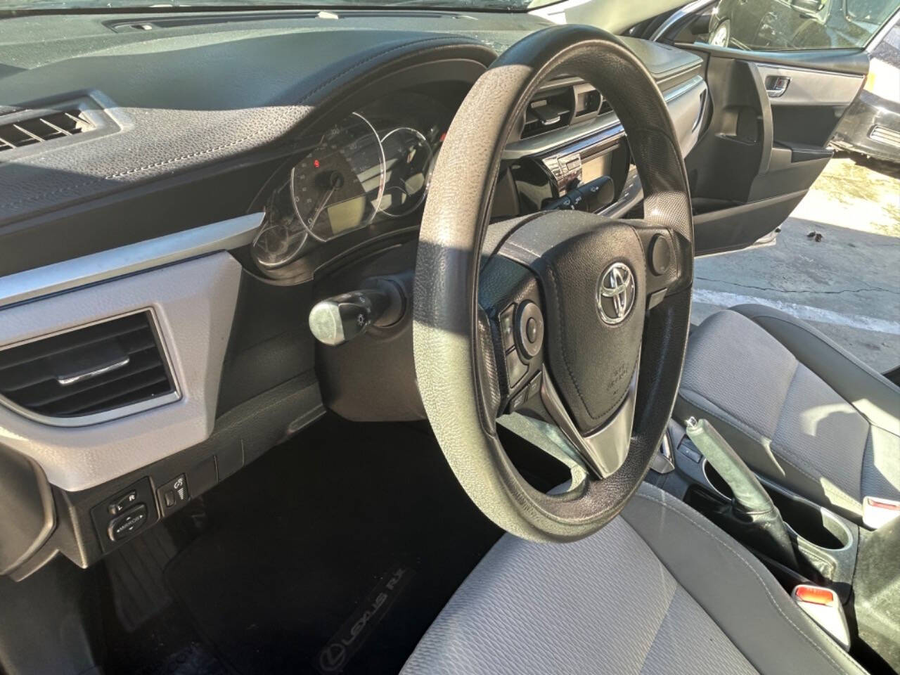 2015 Toyota Corolla for sale at Carmania in Panorama City, CA