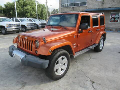 2011 Jeep Wrangler Unlimited for sale at Lone Star Auto Center in Spring TX