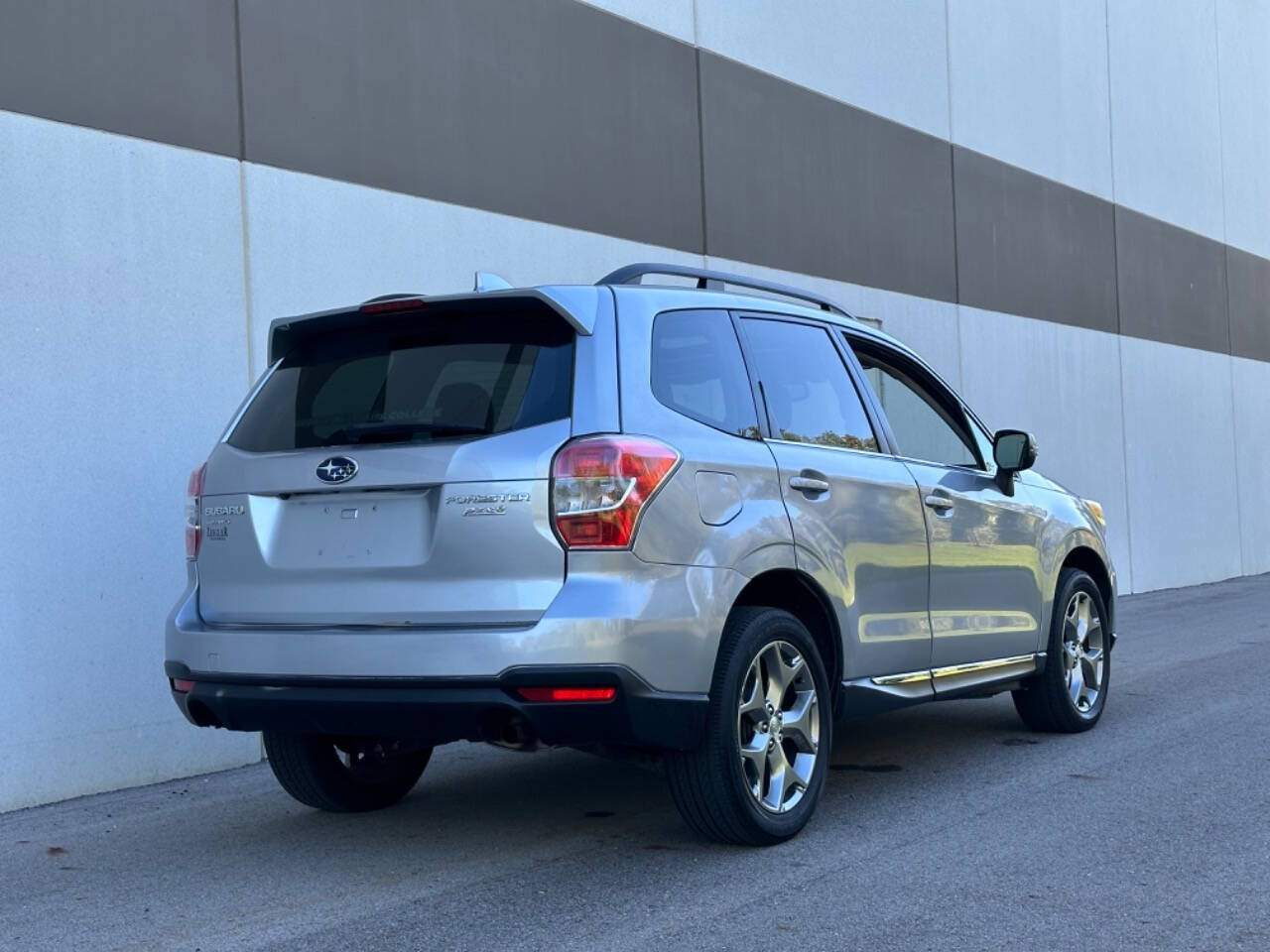 2016 Subaru Forester for sale at Phoenix Motor Co in Romulus, MI