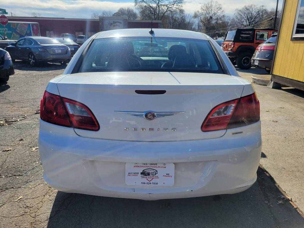 2010 Chrysler Sebring for sale at DAGO'S AUTO SALES LLC in Dalton, GA