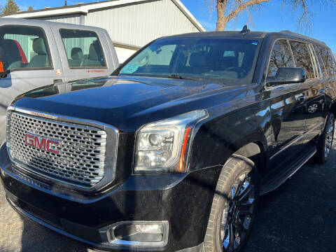 2016 GMC Yukon XL for sale at B & B Auto Sales in Brookings SD