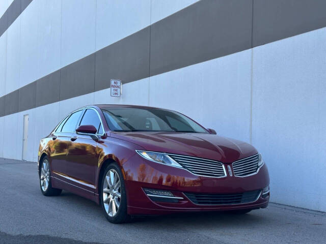 2015 Lincoln MKZ for sale at Phoenix Motor Co in Romulus, MI