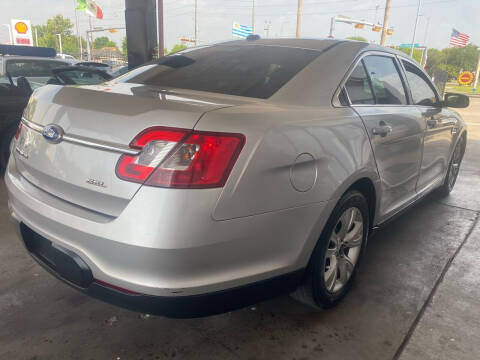 2011 Ford Taurus for sale at Buy-Fast Autos in Houston TX