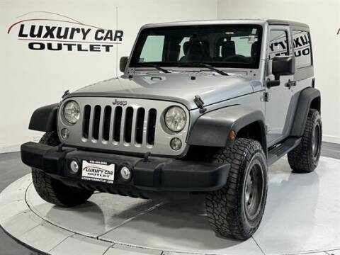 2014 Jeep Wrangler for sale at Luxury Car Outlet in West Chicago IL