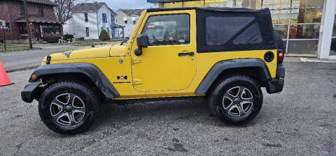 2009 Jeep Wrangler for sale at ELLENBURG MOTORS LLC in Franklin OH