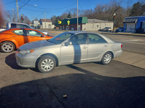 2005 Toyota Camry for sale at Maximum Auto Group II INC in Cortland OH