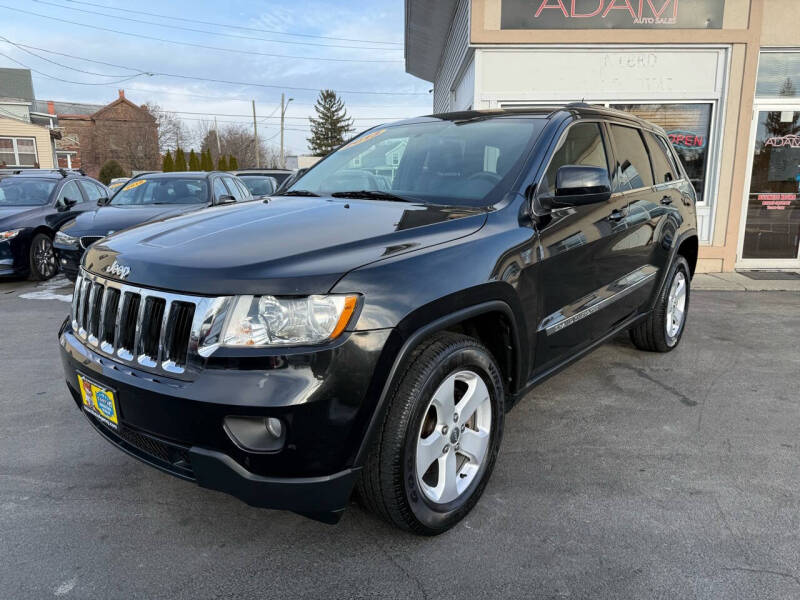 2013 Jeep Grand Cherokee for sale at ADAM AUTO AGENCY in Rensselaer NY