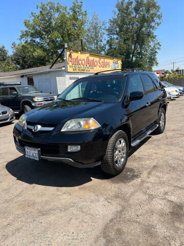 2006 Acura MDX for sale at AUTCO AUTO SALES in Fresno CA