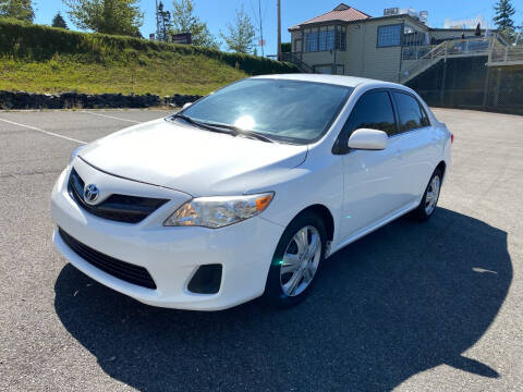 2013 Toyota Corolla for sale at KARMA AUTO SALES in Federal Way WA