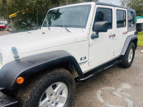 2009 Jeep Wrangler Unlimited for sale at DAN'S DEALS ON WHEELS AUTO SALES, INC. in Davie FL