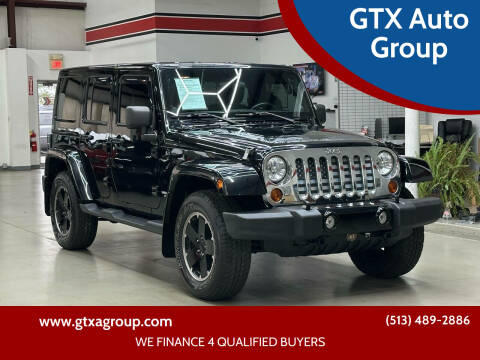 2012 Jeep Wrangler Unlimited for sale at GTX Auto Group in West Chester OH