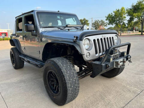 2014 Jeep Wrangler Unlimited for sale at AWESOME CARS LLC in Austin TX