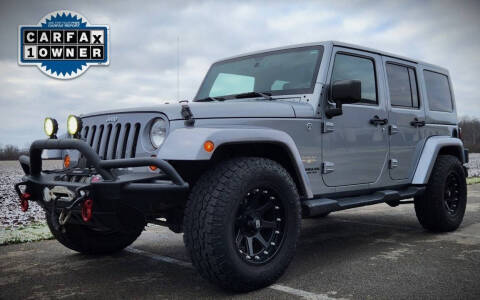 2013 Jeep Wrangler Unlimited for sale at The Motor Collection in Plain City OH