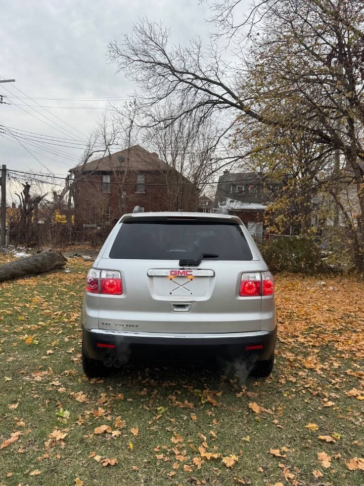 2011 GMC Acadia for sale at H & H AUTO GROUP in Detroit, MI