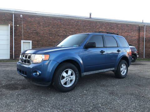 2010 Ford Escape for sale at Jim's Hometown Auto Sales LLC in Byesville OH