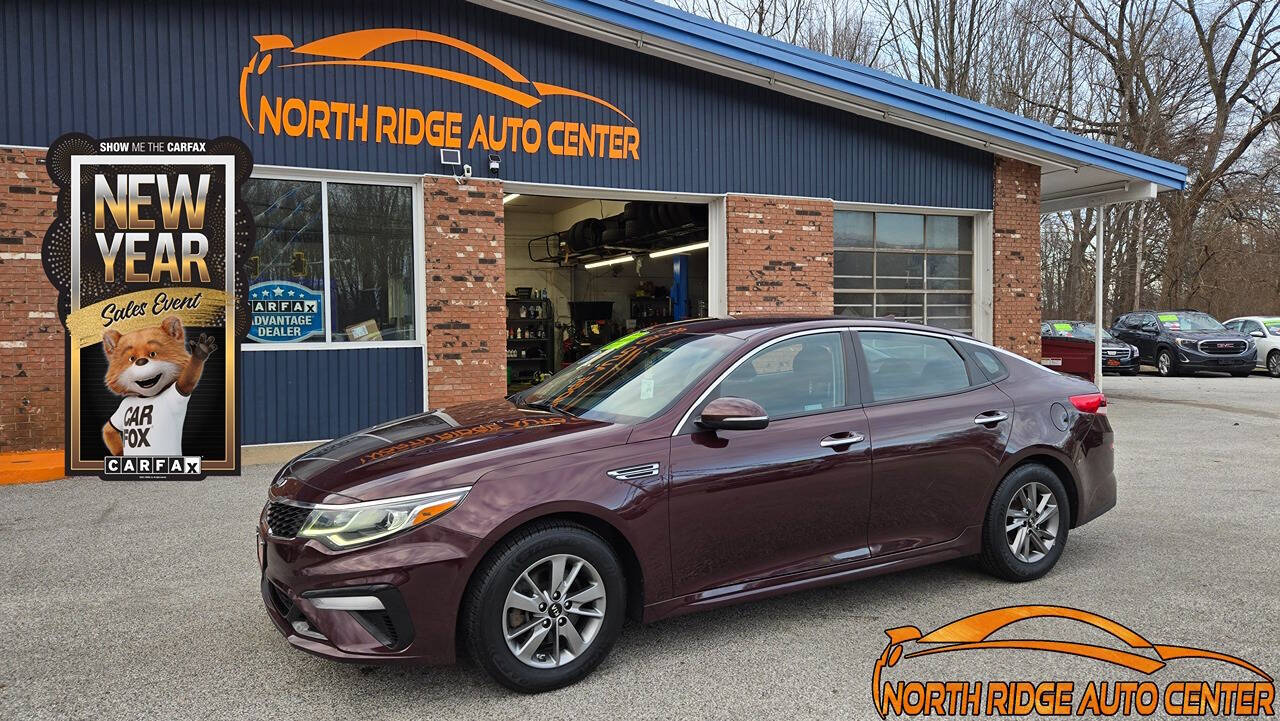 2019 Kia Optima for sale at North Ridge Auto Center LLC in Madison, OH