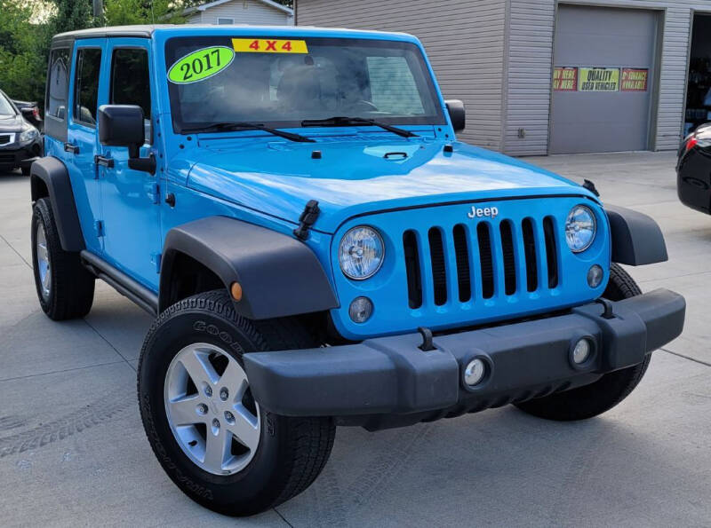 2017 Jeep Wrangler Unlimited for sale at Rigo's Auto Sales, Inc. in Lafayette IN