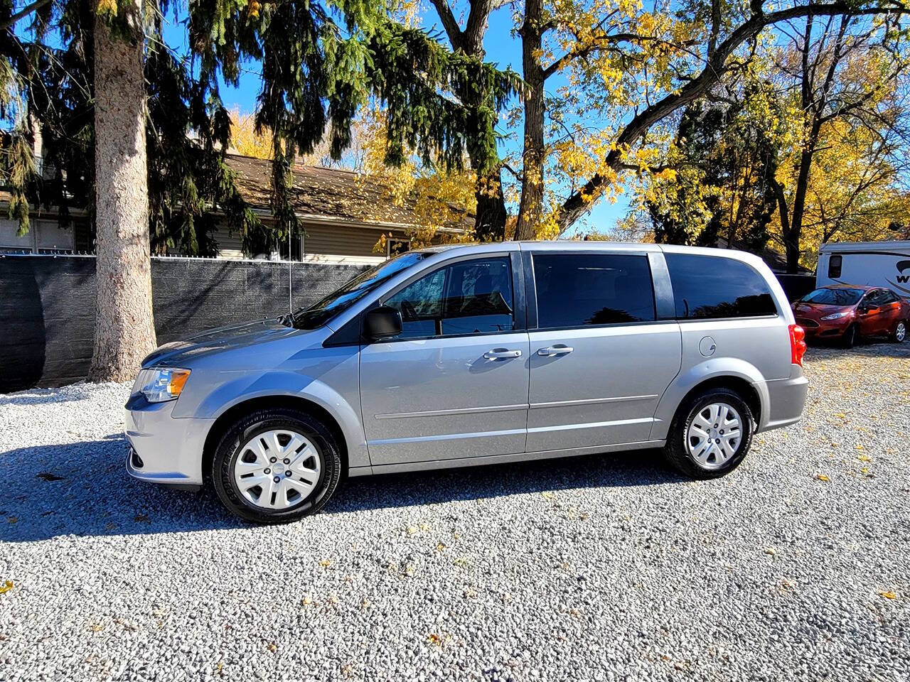 2014 Dodge Grand Caravan for sale at Statewide Auto LLC in Akron, OH