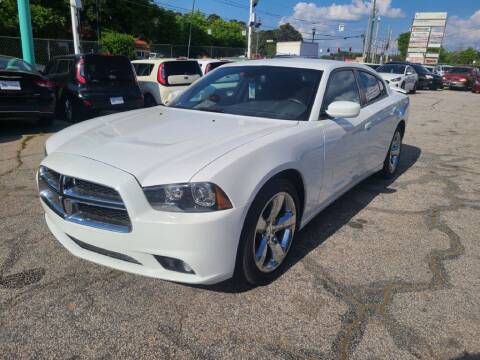2014 Dodge Charger for sale at King of Auto in Stone Mountain GA