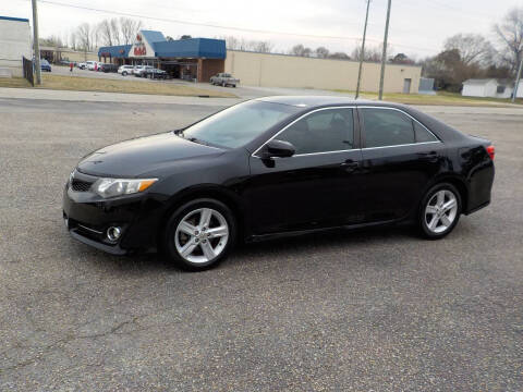 2013 Toyota Camry for sale at Young's Motor Company Inc. in Benson NC