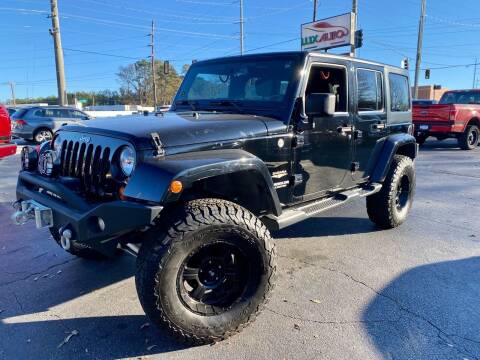 2013 Jeep Wrangler Unlimited for sale at Lux Auto in Lawrenceville GA