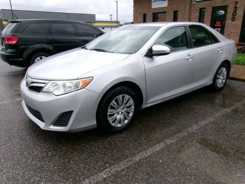 2014 Toyota Camry for sale at Flywheel Motors, llc. in Olive Branch MS