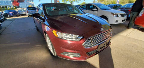 2013 Ford Fusion for sale at Divine Auto Sales LLC in Omaha NE