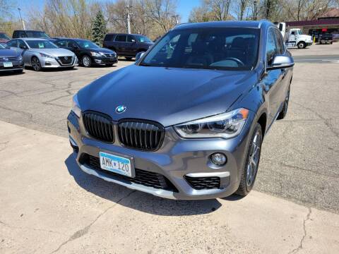 2017 BMW X1 for sale at Prime Time Auto LLC in Shakopee MN