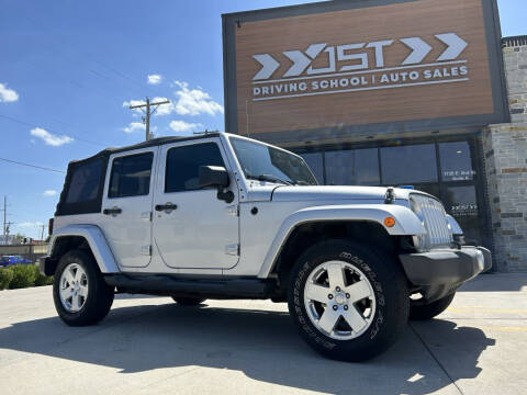 2011 Jeep Wrangler Unlimited for sale at YOST AUTO SALES in Wichita KS