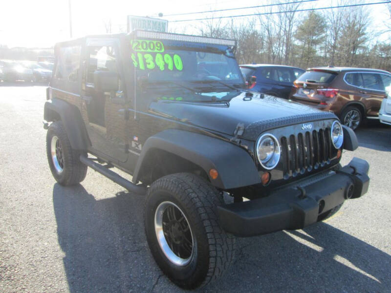 2009 Jeep Wrangler for sale at WORKMAN AUTO INC in Pleasant Gap PA