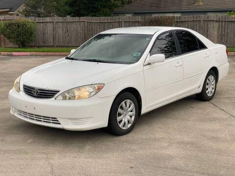 2005 Toyota Camry for sale at KM Motors LLC in Houston TX