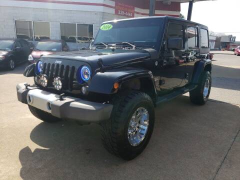 2014 Jeep Wrangler Unlimited for sale at Northwood Auto Sales in Northport AL