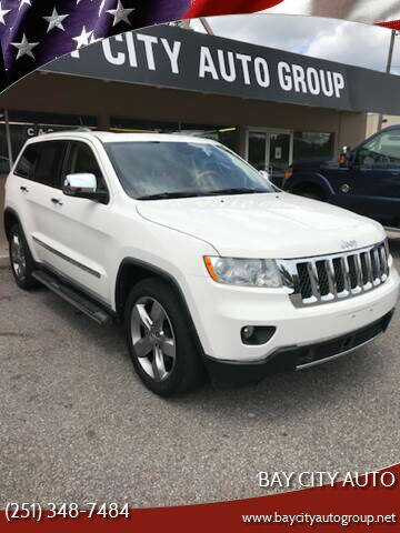 2012 Jeep Grand Cherokee for sale at Bay City Auto's in Mobile AL