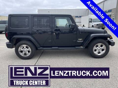 2015 Jeep Wrangler Unlimited for sale at LENZ TRUCK CENTER in Fond Du Lac WI