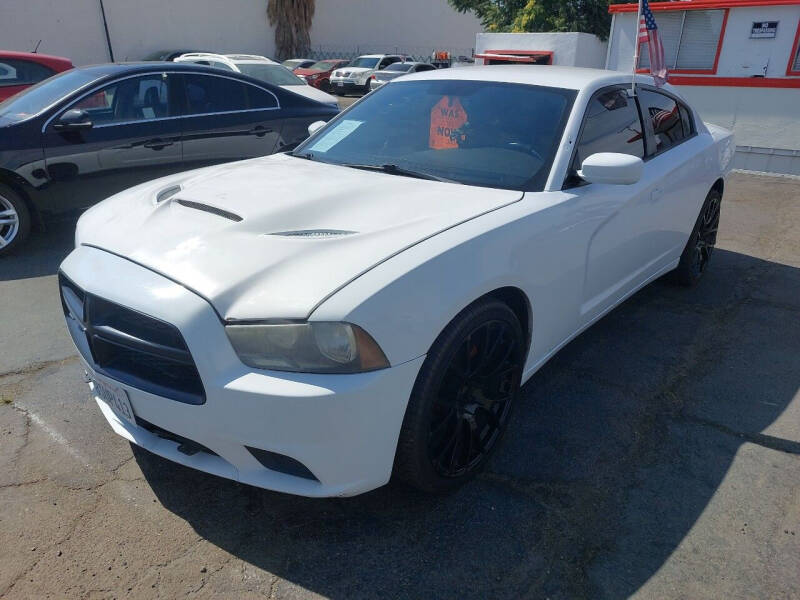 2013 Dodge Charger for sale at Alpha 1 Automotive Group in Hemet CA