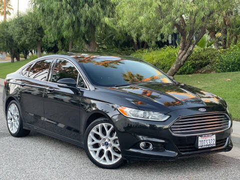 2014 Ford Fusion for sale at MILLENNIUM MOTORS in Van Nuys CA