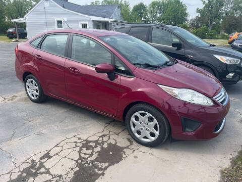 2011 Ford Fiesta for sale at HEDGES USED CARS in Carleton MI