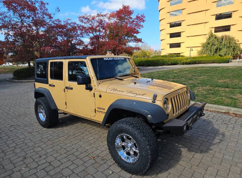 2014 Jeep Wrangler Unlimited for sale at GOLDEN RULE AUTO in Newark OH