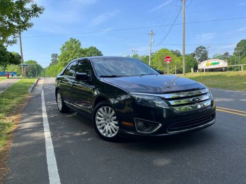 2010 Ford Fusion Hybrid for sale at THE AUTO FINDERS in Durham NC