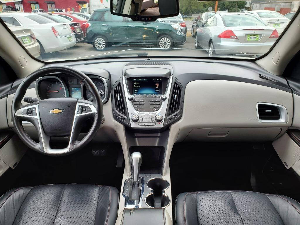 2014 Chevrolet Equinox for sale at DAGO'S AUTO SALES LLC in Dalton, GA