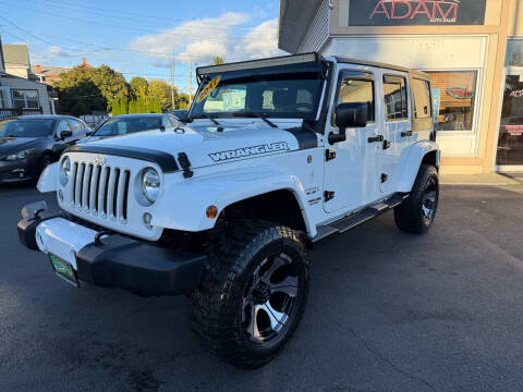 2016 Jeep Wrangler Unlimited for sale at ADAM AUTO AGENCY in Rensselaer NY