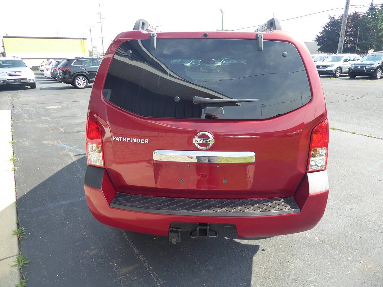 2010 Nissan Pathfinder for sale at Lakeshore Autos in Holland, MI