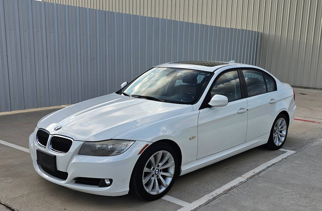 2011 BMW 3 Series for sale at CAR MARKET AUTO GROUP in Sugar Land, TX