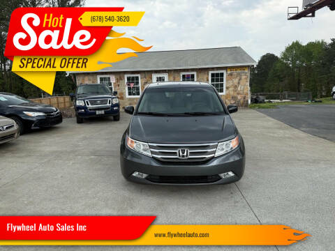 2012 Honda Odyssey for sale at Flywheel Auto Sales Inc in Woodstock GA