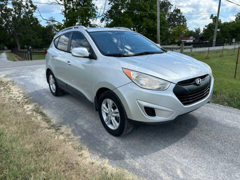 2011 Hyundai Tucson for sale at TRAVIS AUTOMOTIVE in Corryton TN