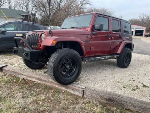 2009 Jeep Wrangler Unlimited for sale at Dave's Auto Care & Sales LLC in Camdenton MO