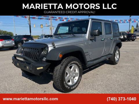 2014 Jeep Wrangler Unlimited for sale at MARIETTA MOTORS LLC in Marietta OH
