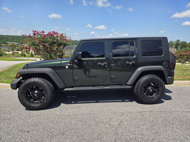 2010 Jeep Wrangler Unlimited for sale at Connected Auto Group in Macon, GA