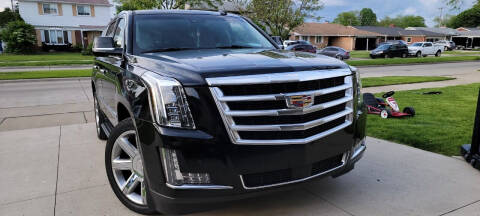 2016 Cadillac Escalade for sale at QUEST AUTO GROUP LLC in Redford MI