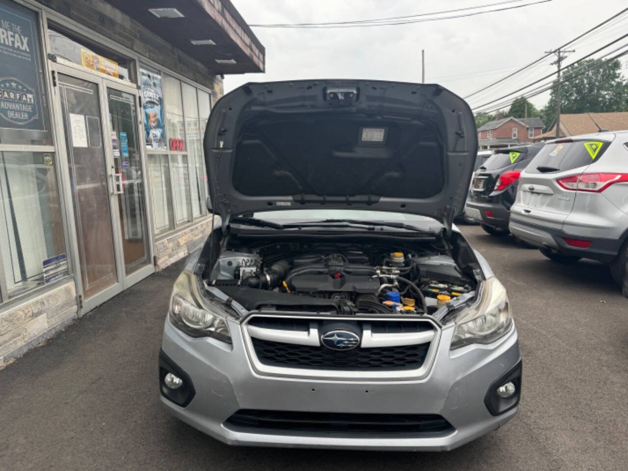 2012 Subaru Impreza for sale at B N M Auto Sales Inc in New Castle, PA